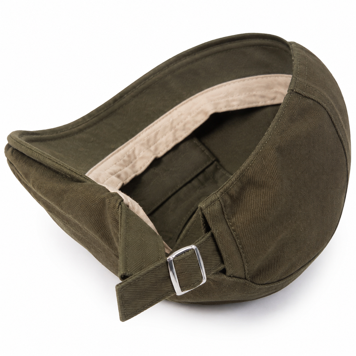 Close-up of the Classic Driver Cap Field Olive interior and silver adjustment buckle on a white background