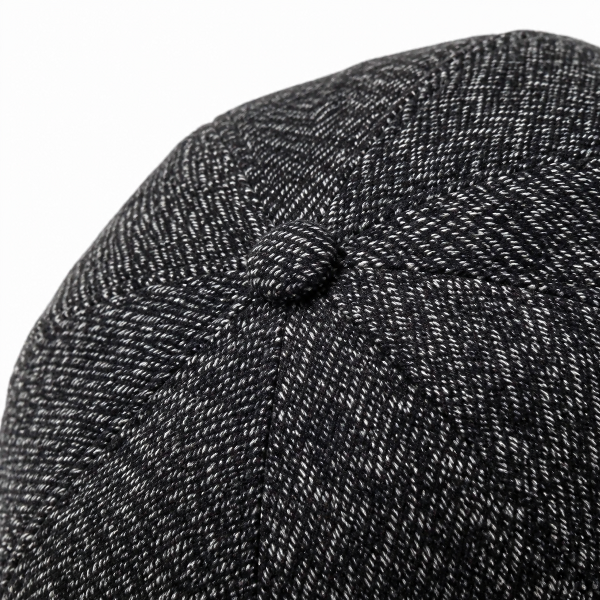 Tweed Newsboy Cap Coal Black - top button and panel seam detail
